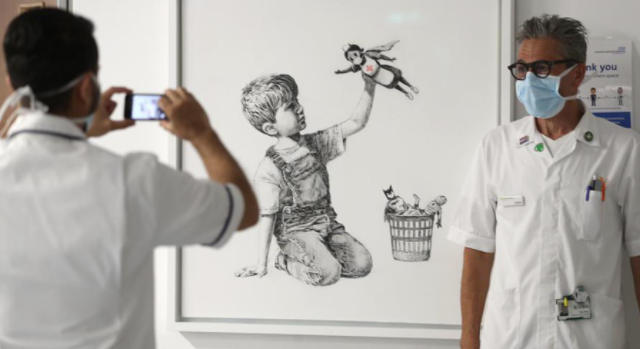 Forbes's tweet photo. A painting by Banksy, the most high-profile street artist in the world, broke the artist’s record for most expensive work to sell at auction today https://t.co/CJntLkhD19 https://t.co/av0ywnlgHq