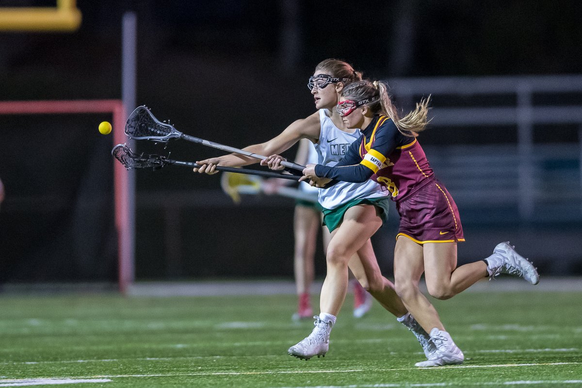 Medina's @lucyocull battles for the ball against Avon Lake. <a href="/medinagirlslax/">Medina Girls Lacrosse</a>