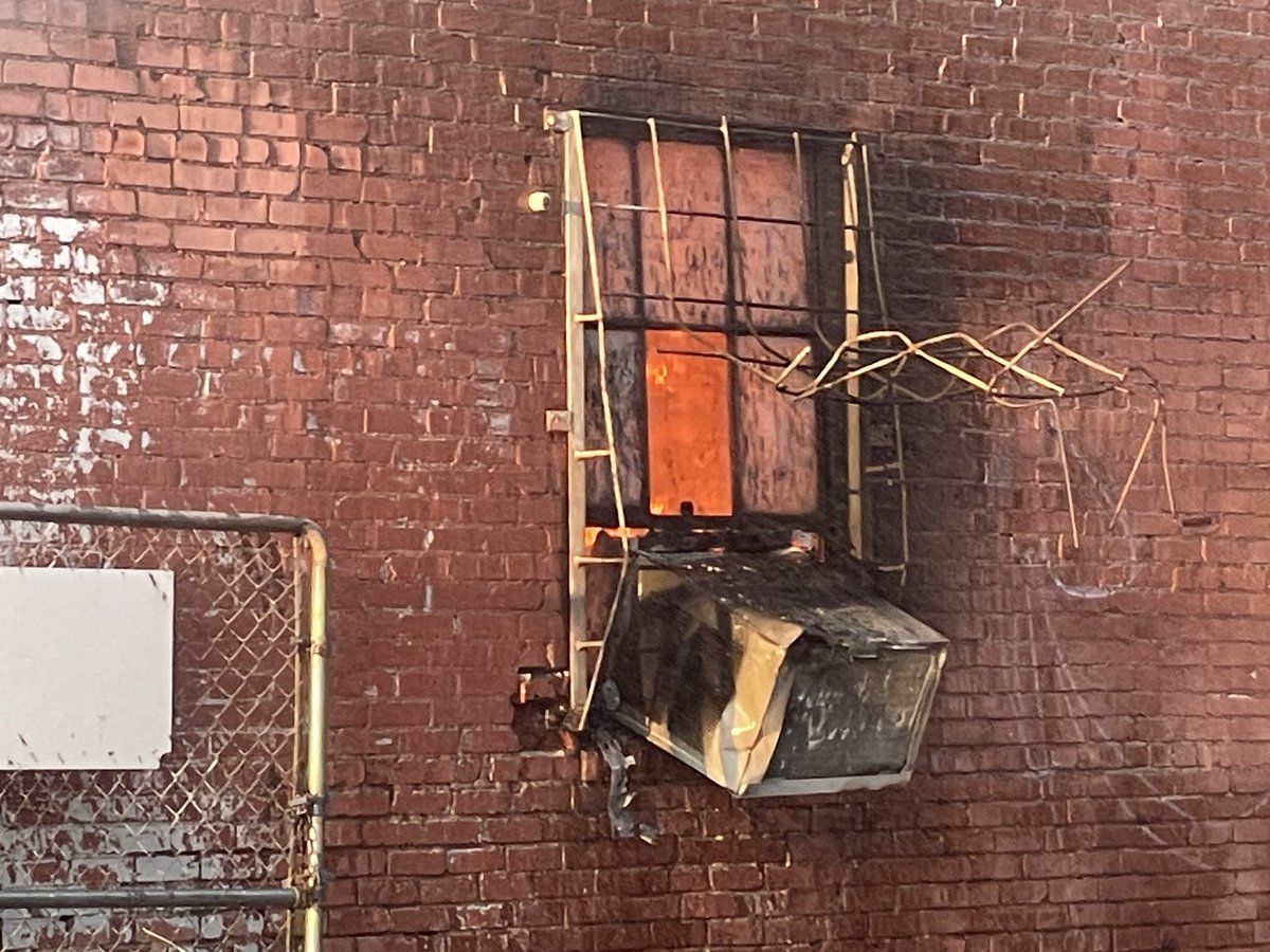 OKCFD's tweet photo. An adult female was rescued from this window just moments before flames engulfed that portion of the building. https://t.co/jO5cOFDxWo