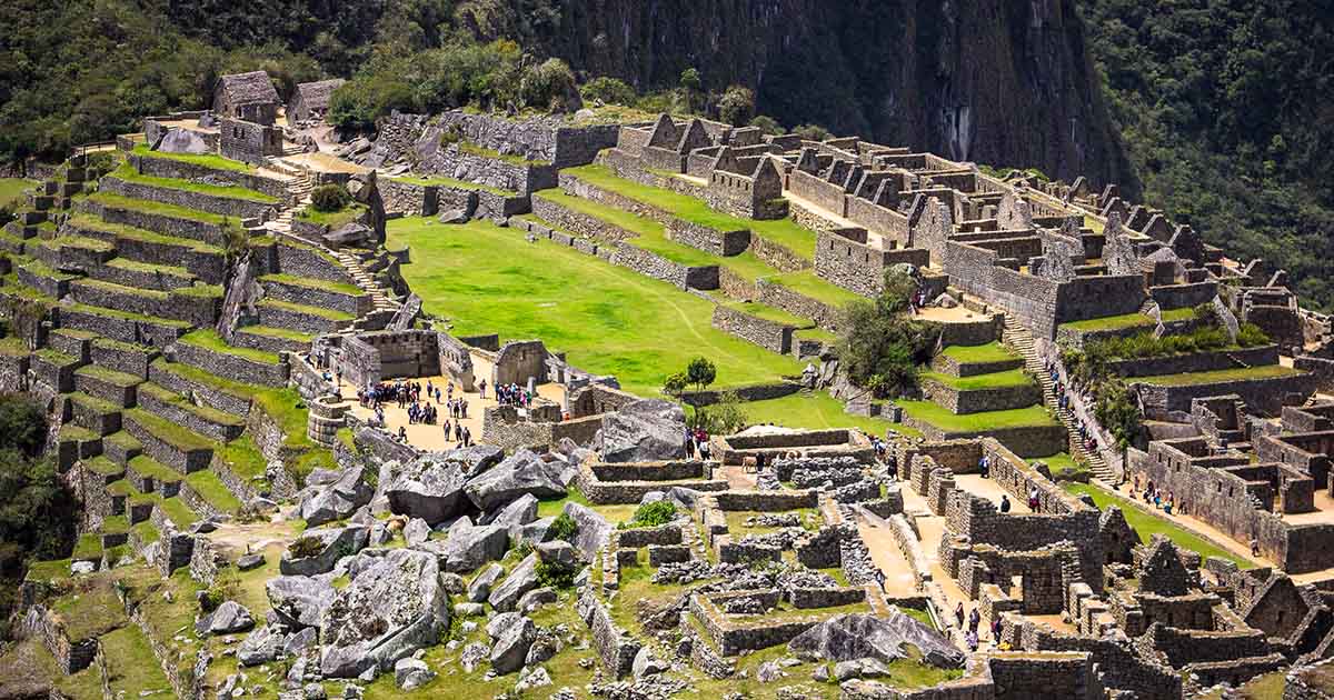 Machu Picchu! It's a 15th century Inca citadel perched high up in the Andes Mountains of southern Peru. It's located on a 7,970 ft tall ridge. It's believed it was originally intended as an estate for the Inca emperor Pachacuti. It was never actually found by the Spanish.......