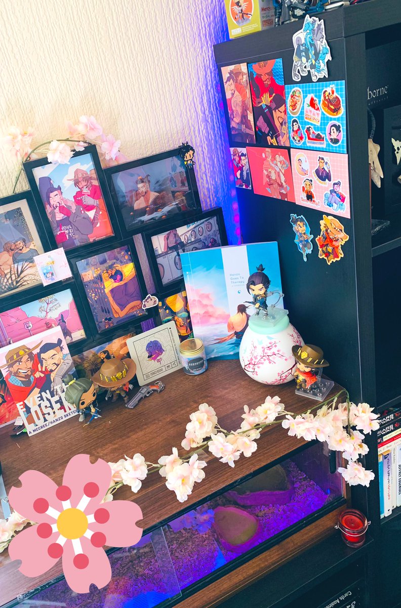 rearranged my hanzos! i finally framed my <a href="/hnzotherapyzine/">Hanzo Goes to Therapy Zine 🌱</a> prints to go along with my <a href="/dilfosaur/">neo-spacian karina rat</a> zine ones!