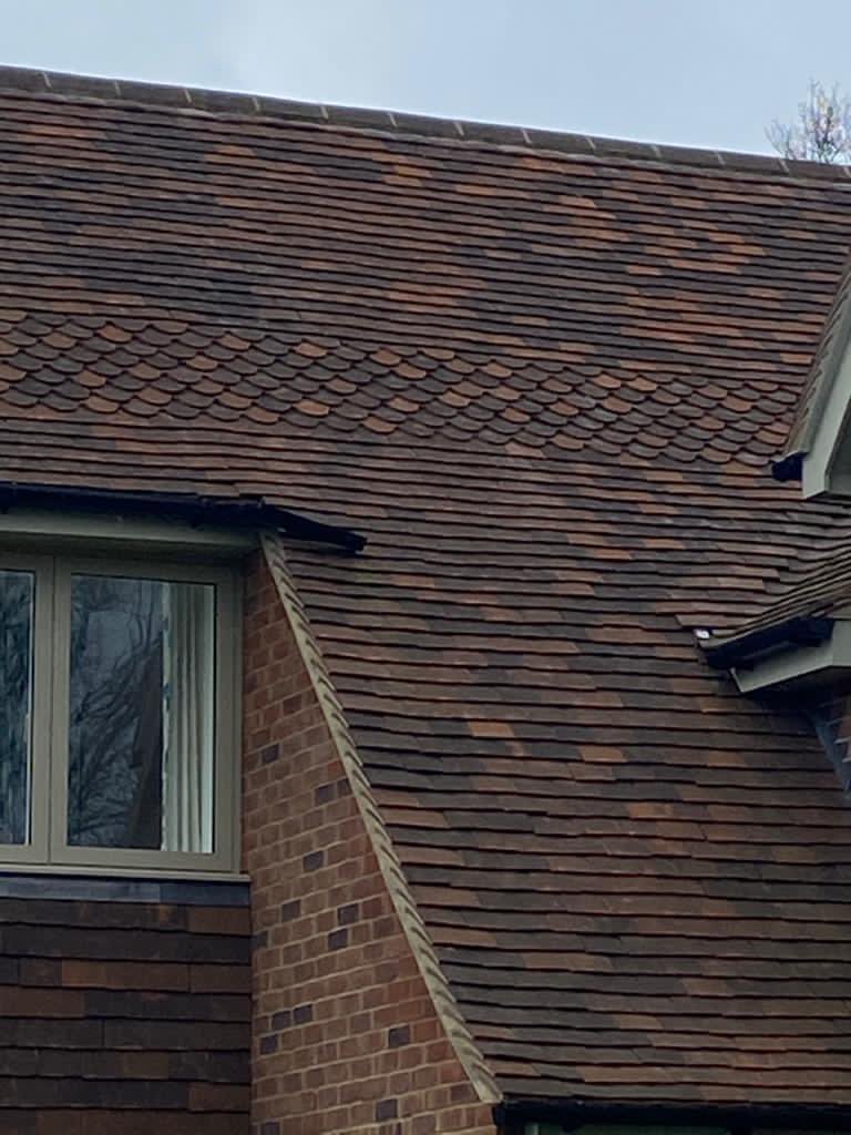 LifestilesLtd's tweet photo. Did you know we manufacture a range of decorative tiles? This project in Sussex made use of our Woburn Reclamation club tiles to provide an additional feature #lifestiles #clayrooftiles #roofing https://t.co/B7OKCXLDIi