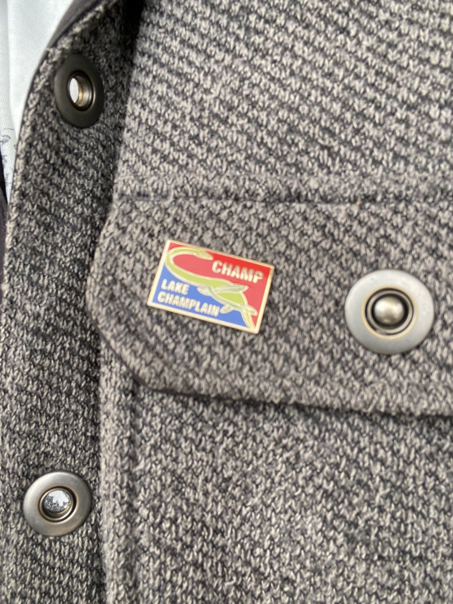MGizely's tweet photo. With #springtime comes wardrobe changes. Repping my local #cryptid with my #LakeChamplain #Champ enamel pin 😎  @MAUPodcast - can’t wait for yours to join the collection! #keepitspooky https://t.co/I3s4IVwsje