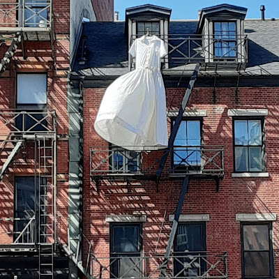 evgrieve's tweet photo. On Sunday, E. Jay Sims hung a large shirtwaist dress on the top-floor fire escape at 306 Bowery at 1st Street. She mounted the dress in honor of Women's History Month, and in memory of the deadly Triangle Shirtwaist Factory Fire, whose 110th anniversary is March 25. 

1/2 https://t.co/IPeBBMFkBi