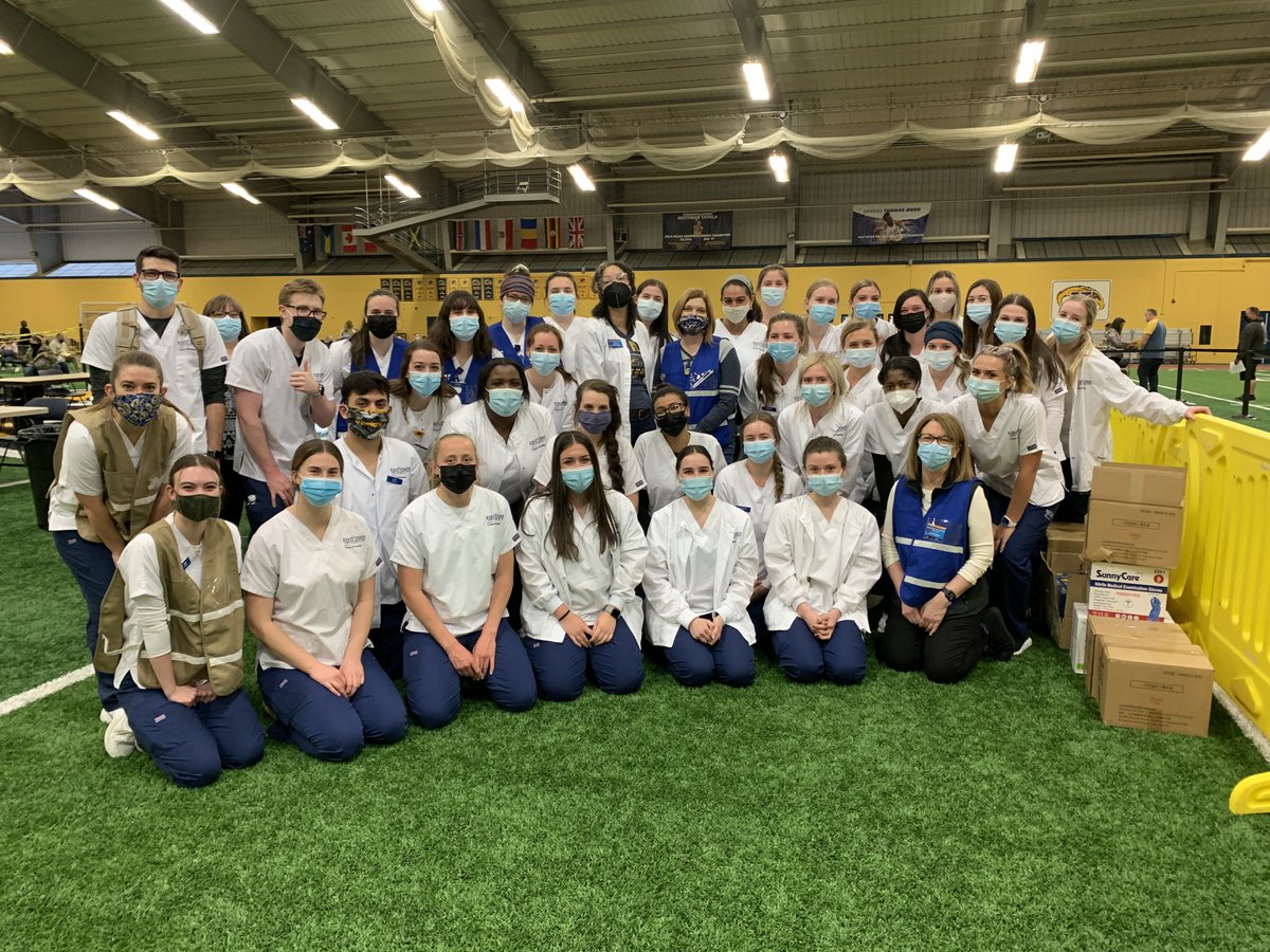 kentnursing's tweet photo. .@kentnursing students and faculty volunteers helped make the initial mass COVID-19 vaccination site at the @kentstate Field House possible. The @PortageCoHealth will hold a vaccination clinic every Tuesday at the field house this spring. Learn more: https://t.co/GwdtmxVxi2. https://t.co/NAenvjKhEi