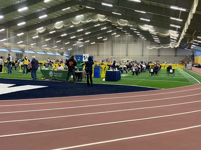kentnursing's tweet photo. .@kentnursing students and faculty volunteers helped make the initial mass COVID-19 vaccination site at the @kentstate Field House possible. The @PortageCoHealth will hold a vaccination clinic every Tuesday at the field house this spring. Learn more: https://t.co/GwdtmxVxi2. https://t.co/NAenvjKhEi