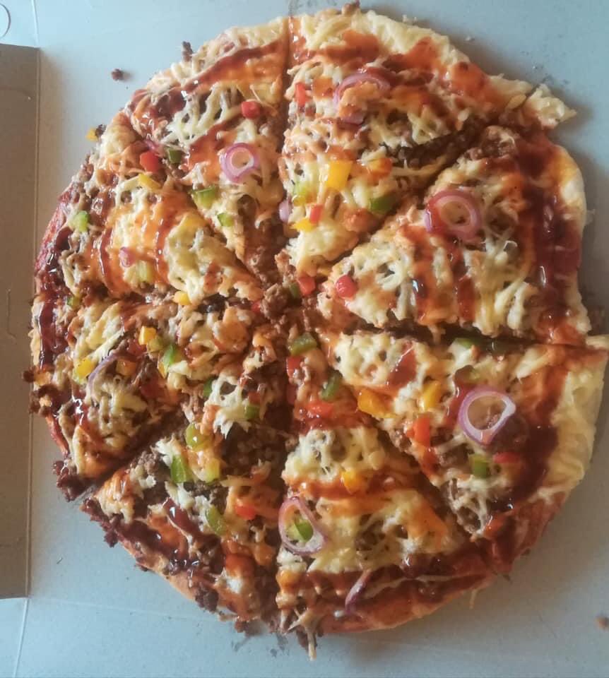 CornerPizza's tweet photo. our Double decker is their Triple decker Size https://t.co/WHGF6ZeiRm