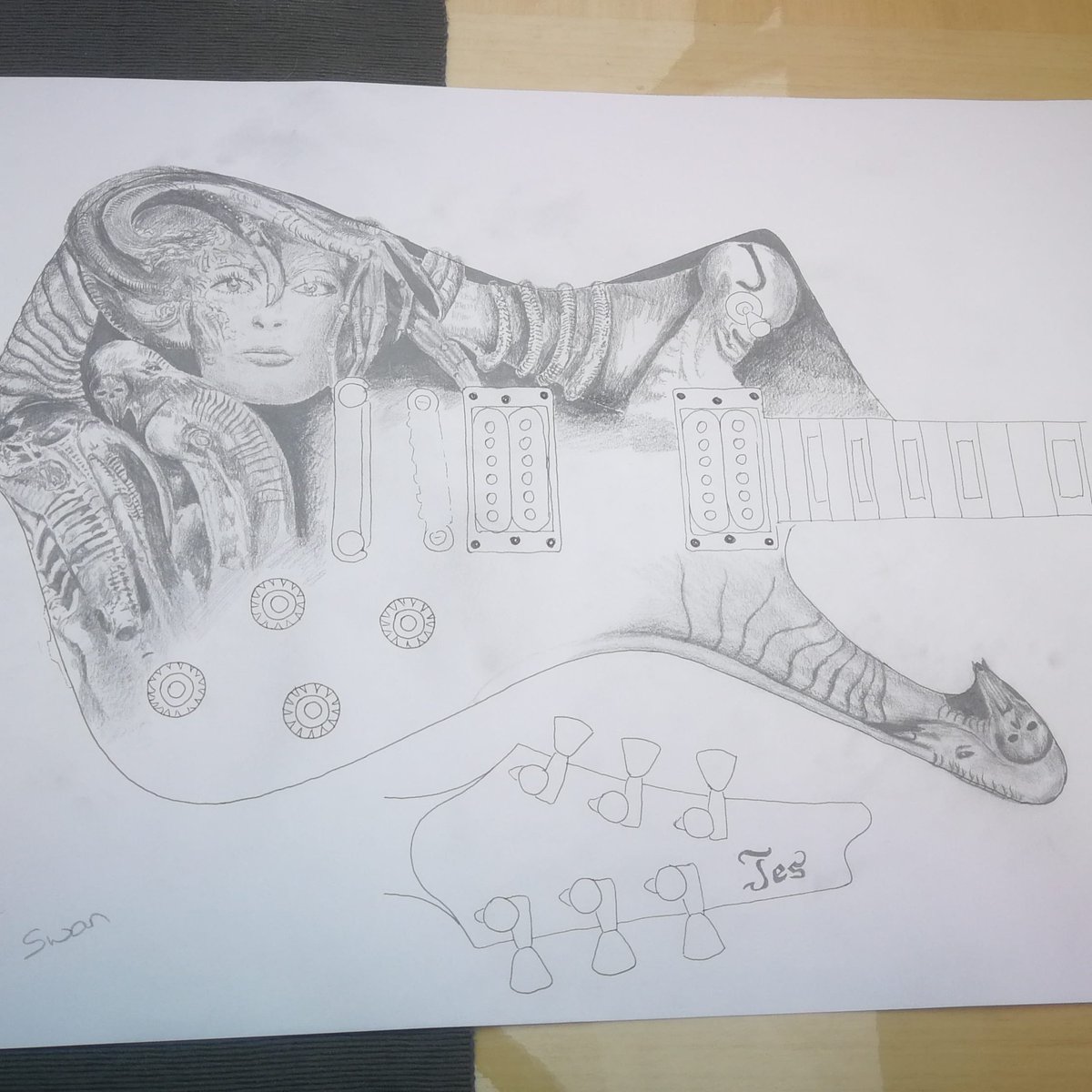 TheSecret_Swan's tweet photo. Excited to be designing again for a potential commission. For your own, no obligation design, contact me directly

#carvedguitar #electricguitar #guitar #music #handmade #guitarist #hggiger #alien #woodcarving #woodart https://t.co/1UrngnI2z4