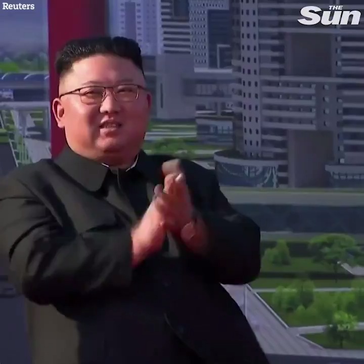 Kim Jong un applauds blasts during the opening ceremony of a construction project
