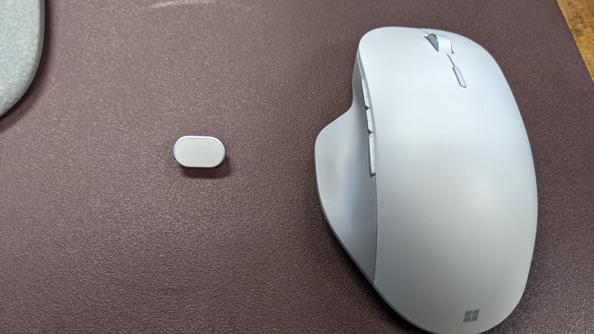 bricomp's tweet photo. Tiny little #SurfaceHub2 thumbprint scanner (mouse for comparison). Easy to install - push into USB-C port and done. Thank you @surface @y0avb https://t.co/4Lby9jYHgF