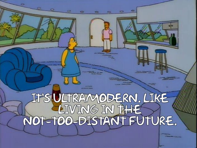 A scene from the Simpsons, in which Selma describes Troy McClure's home as "ultramodern, like living in the not-too-distant future"
