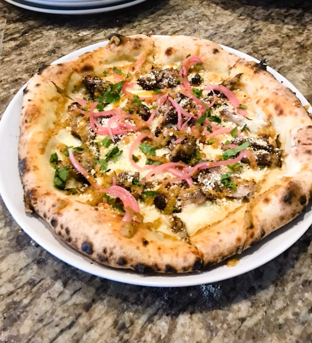 New Pizza Special in our Mckinney location!

🍕 Carnita Pizza🍕

slow-roasted pork shoulder with mozzarella, olive oil, topped with cotija, pickled red onions, tomatillo salsa, cilantro

Available all week long *while supplies last*
