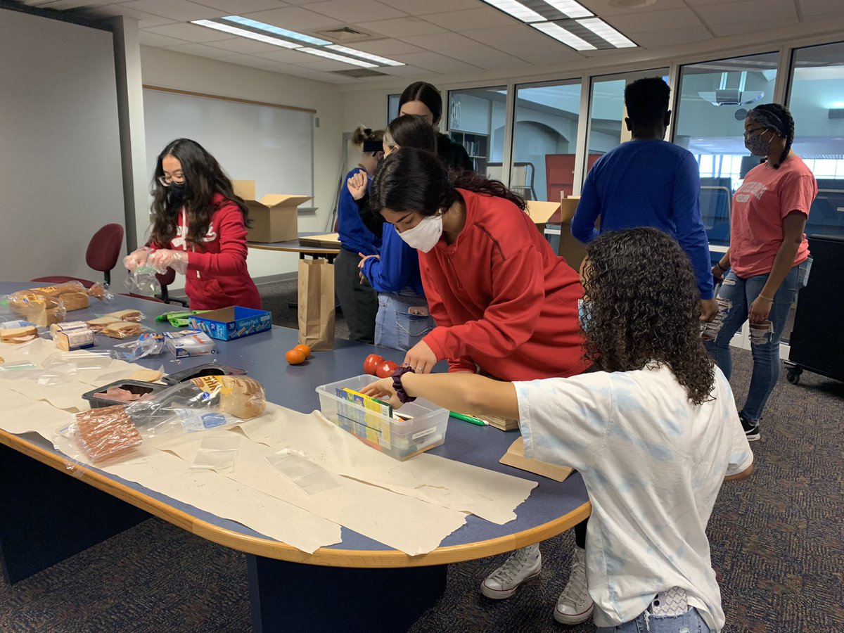 JghsDeca's tweet photo. The @JghsDeca members packing 30 meals to feed the homeless in Detroit. @MichiganDECA https://t.co/etwHLLXGMW