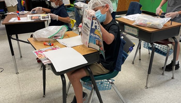 WoodRiverElemen's tweet photo. #TextFeatureSurgery #2ndgrsurgeonsatwork Mrs. Juarez's class cutting Non-Fiction Titles and Features. https://t.co/s74YMOowhM