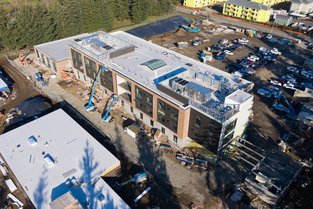 ryanjpugh's tweet photo. Some drone shots of @evergreenps Admin Center with a couple months to go!

📷: @sgbenes https://t.co/E9CJF7J8fp