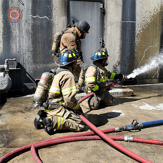 MassDFS's tweet photo. #Recruits from #Class291 are graded on Hose Evolution 2 which includes a small, inside fire. Prior to making entry, the nozzle firefighter checks the water flow &amp; pattern at the door. https://t.co/tXCofFhw6O