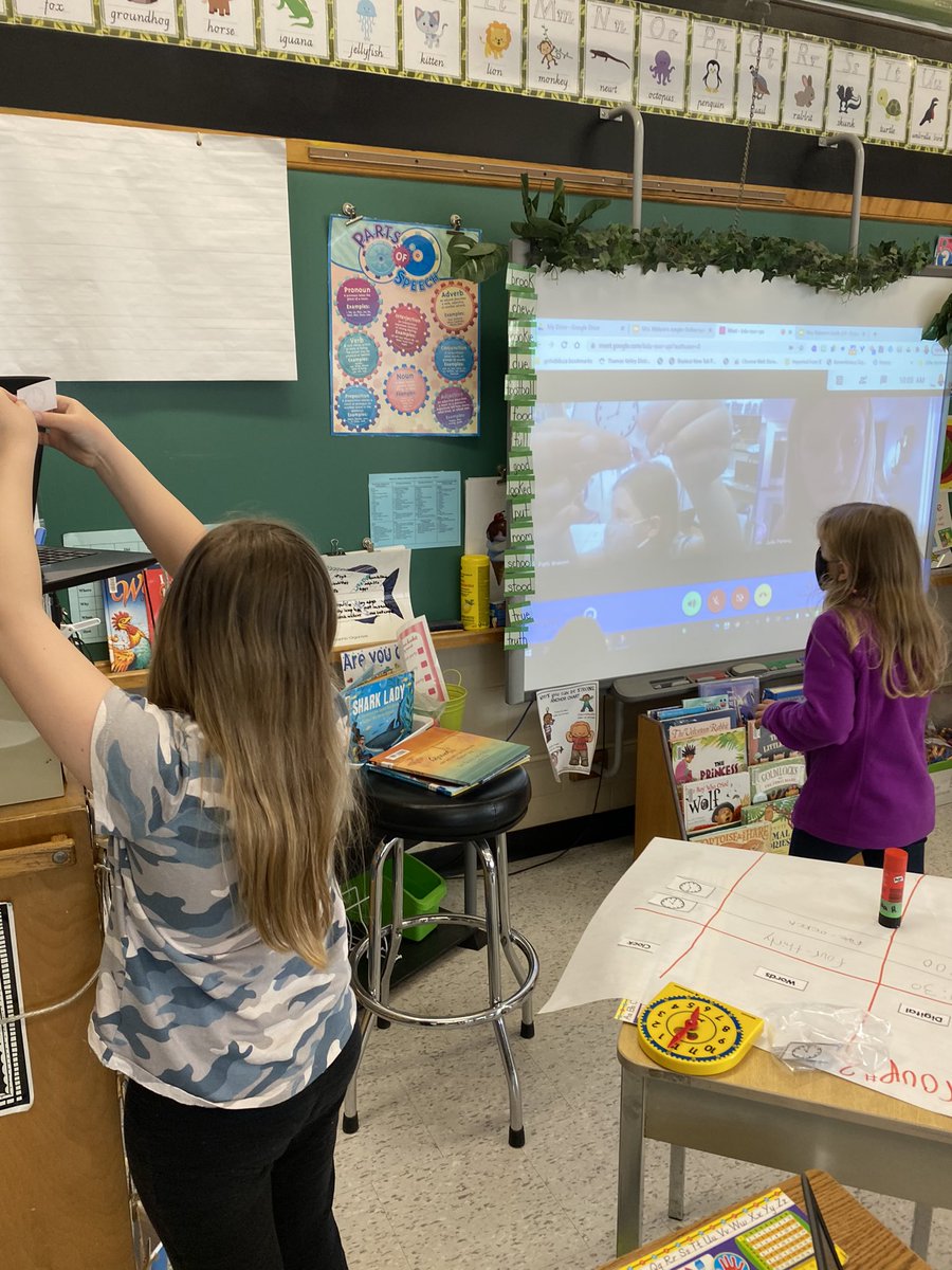 MrsWakem's tweet photo. Group work over Google Meet. #learningdoesnotstop Can you tell the time on the analogue clock? @SDStampeders #tvdsbmath #technology https://t.co/KQQpWD17Ki