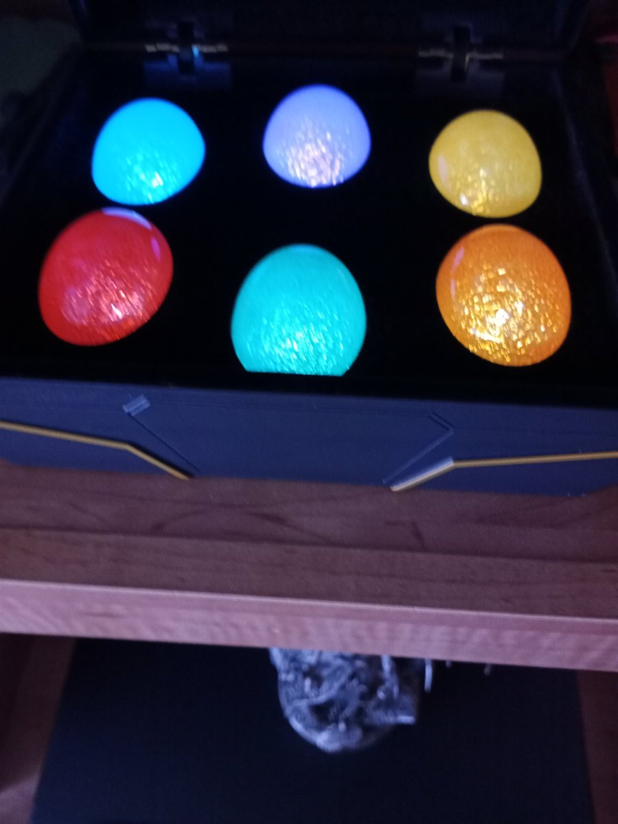 MasterRayashi's tweet photo. In the picture the dark blue infinity stones color isn't as noticeably different, but it is very much darker. The green chair is my old chair. https://t.co/QLycMiemsY