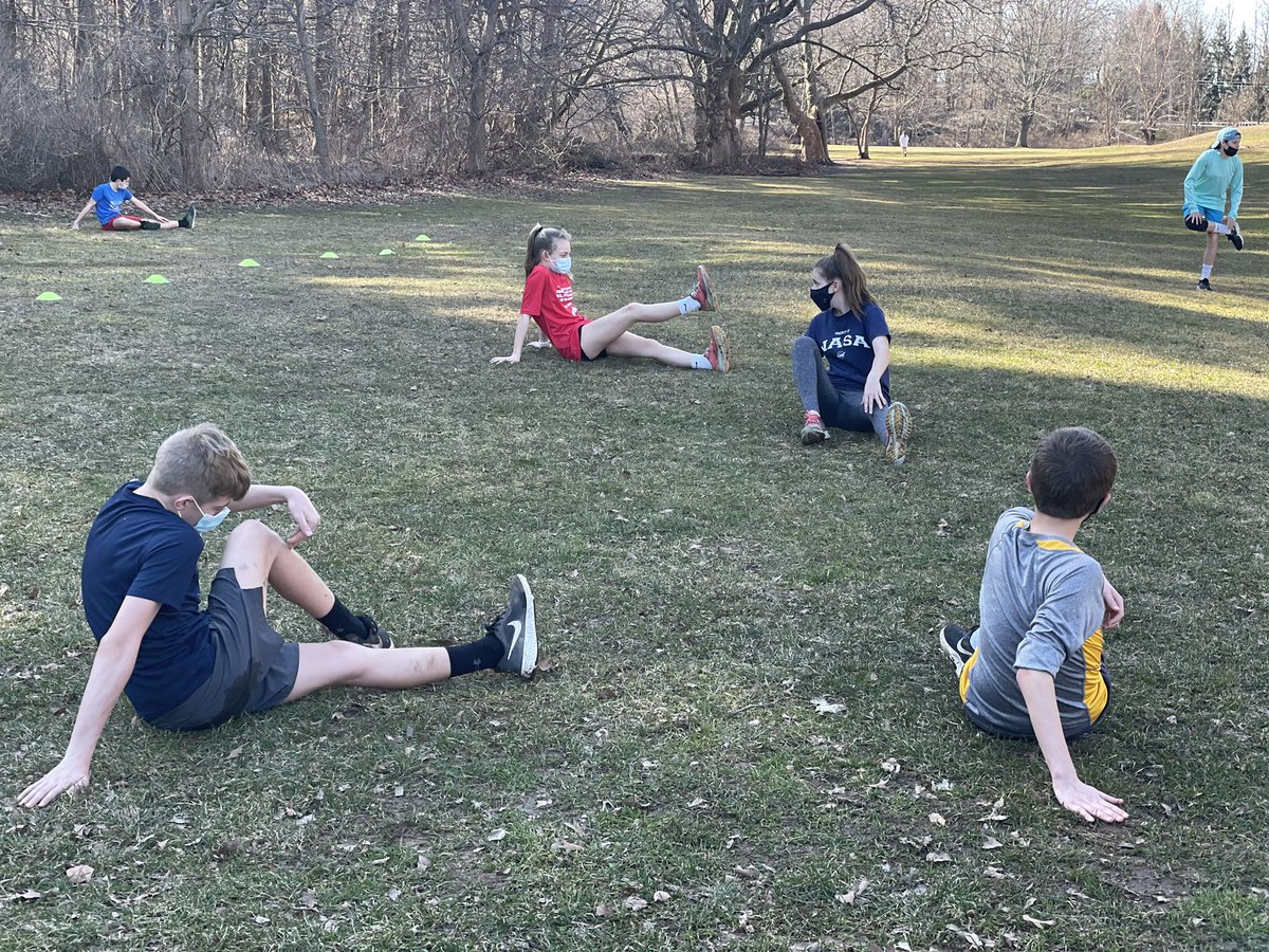 EMLantzer's tweet photo. Team Captains leading us in stretches before our run today #willinkXC https://t.co/rkcnyCG5g4