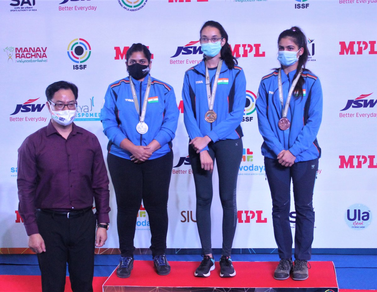 indianshooting's tweet photo. ISSF World Cup: India's @SarnobatRahi, @ChinkiYadav4 &amp; @realmanubhaker with @KirenRijiju after claiming all three medals in Women's 25m Pistol. https://t.co/RIqEaBfB0v