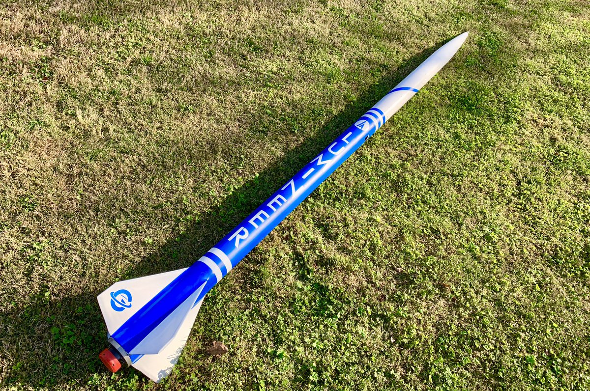 joebarnard's tweet photo. 2.8m tall, 24kg loaded, and aiming for a 10km apogee! The paint scheme was generously designed by @GeoffdBarrett and WOW does it look good. Here’s hoping the rocket flies straight, and comes back in one piece! https://t.co/uiEiXNyt40