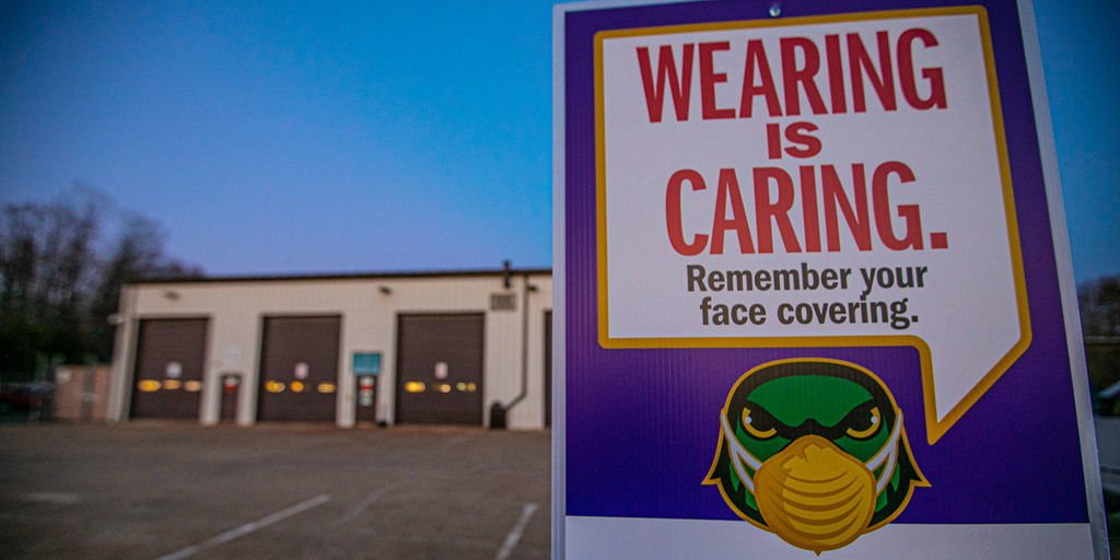 NOVAcommcollege's tweet image. Do you recognize the campus behind the sign?

#WearingIsCaring #StaySafeWithAce