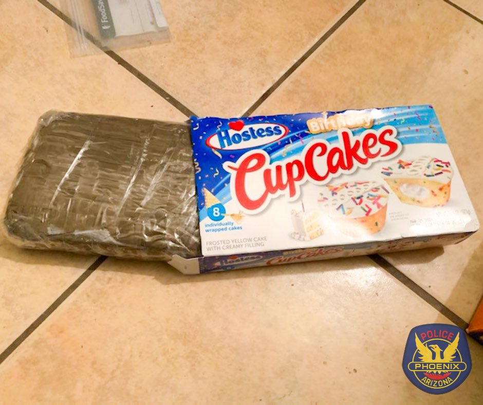 PhoenixPolice's tweet photo. Some drug dealers think outside the box (cupcake box) when hiding drugs. This didn't work with our Drug Enforcement Bureau (DEB) Detectives. They found the drugs, money and guns. https://t.co/HgpACrZU1Z