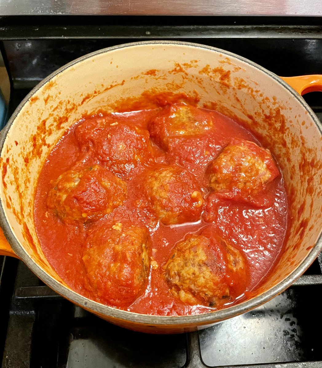 Challenge: about 1/3 lb ground pork and 1/3 lb ground lamb. Also in the fridge: a hard boiled egg, a cooked potato, small thing of rice. Solution: albondigas-style meatballs. With a quarter egg in the middle of each.