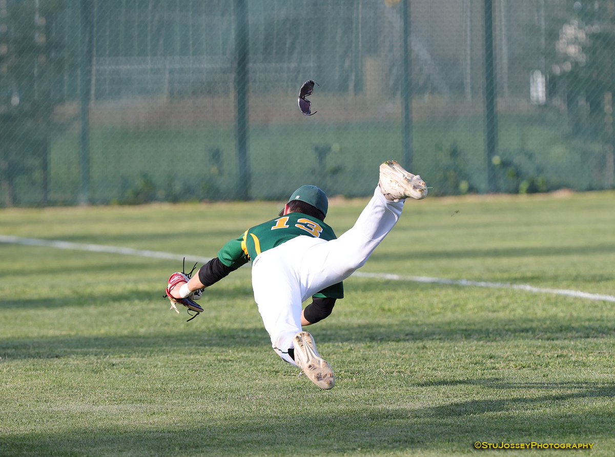 Daniel Behrmann makes a stellar catch in foul ground leaving his 3rd base position in today’s 11-5 victory over Kimball.  tracyhighbaseball.com