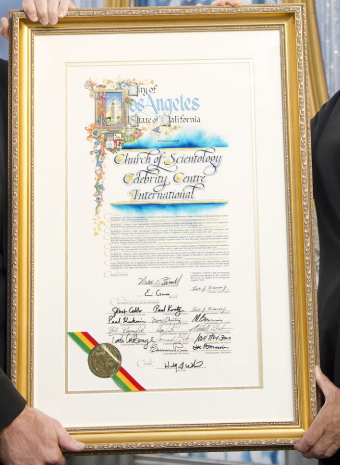 yashar's tweet photo. A reminder that Los Angeles City Councilman @MitchOFarrell has used his position to make supportive statements about Scientology and just a few years ago presented them with a proclamation honoring their work. 

Scientology is a criminal organization that destroys people’s lives. https://t.co/PMh1MOOKoo