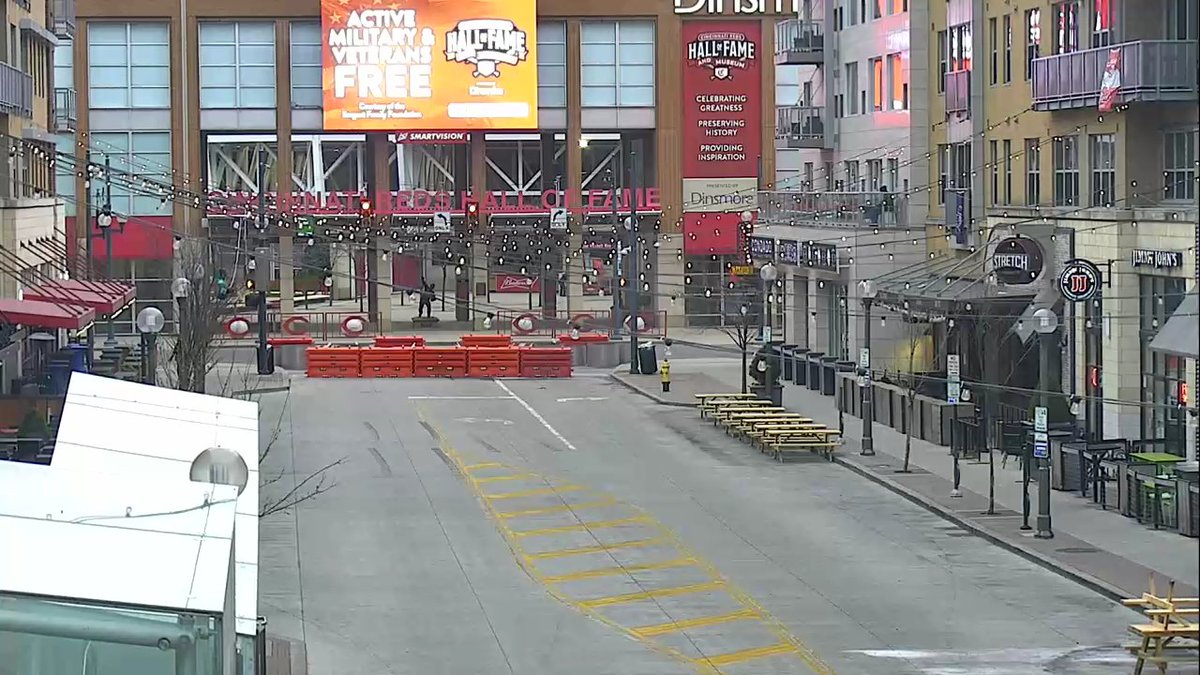 WeMoveCincy's tweet photo. The Banks: Freedom Way b/w Joe Nuxhall Way &amp; Marian Spencer Way is closed permanently to thru #CincyTraffic effective today, March 25, as part of the new "Designated Outdoor Refreshment Area," known as "DORA." Crews installing barricades this morning.  @CincyPD @FOX19 @Local12 https://t.co/UASSDoLdEq