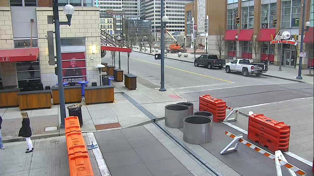 WeMoveCincy's tweet photo. The Banks: Freedom Way b/w Joe Nuxhall Way &amp; Marian Spencer Way is closed permanently to thru #CincyTraffic effective today, March 25, as part of the new "Designated Outdoor Refreshment Area," known as "DORA." Crews installing barricades this morning.  @CincyPD @FOX19 @Local12 https://t.co/UASSDoLdEq