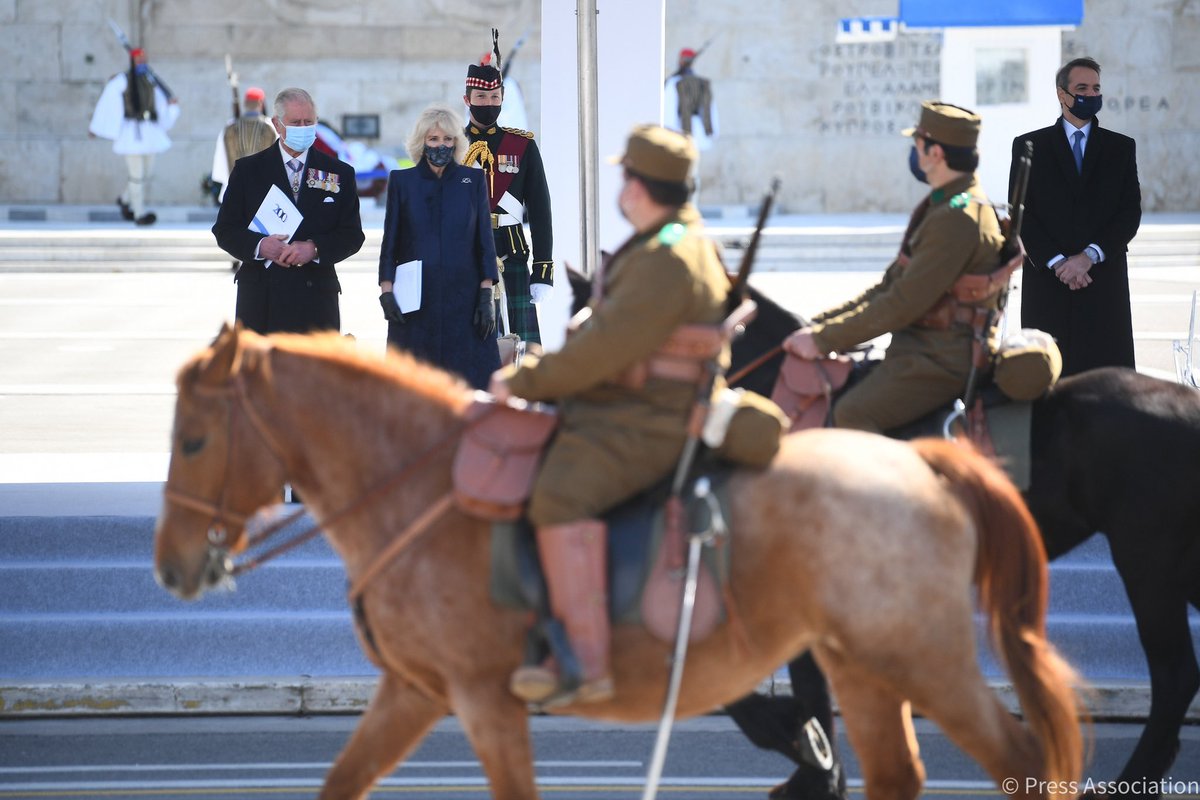 ClarenceHouse's tweet photo. As part of the Bicentenary Independence Day celebrations at Syntagma Square, The Prince of Wales and The Duchess of Cornwall view a military parade by members of the Hellenic Armed Forces, followed by a flypast.

#RoyalVisitGreece https://t.co/AkWGzQuW7m