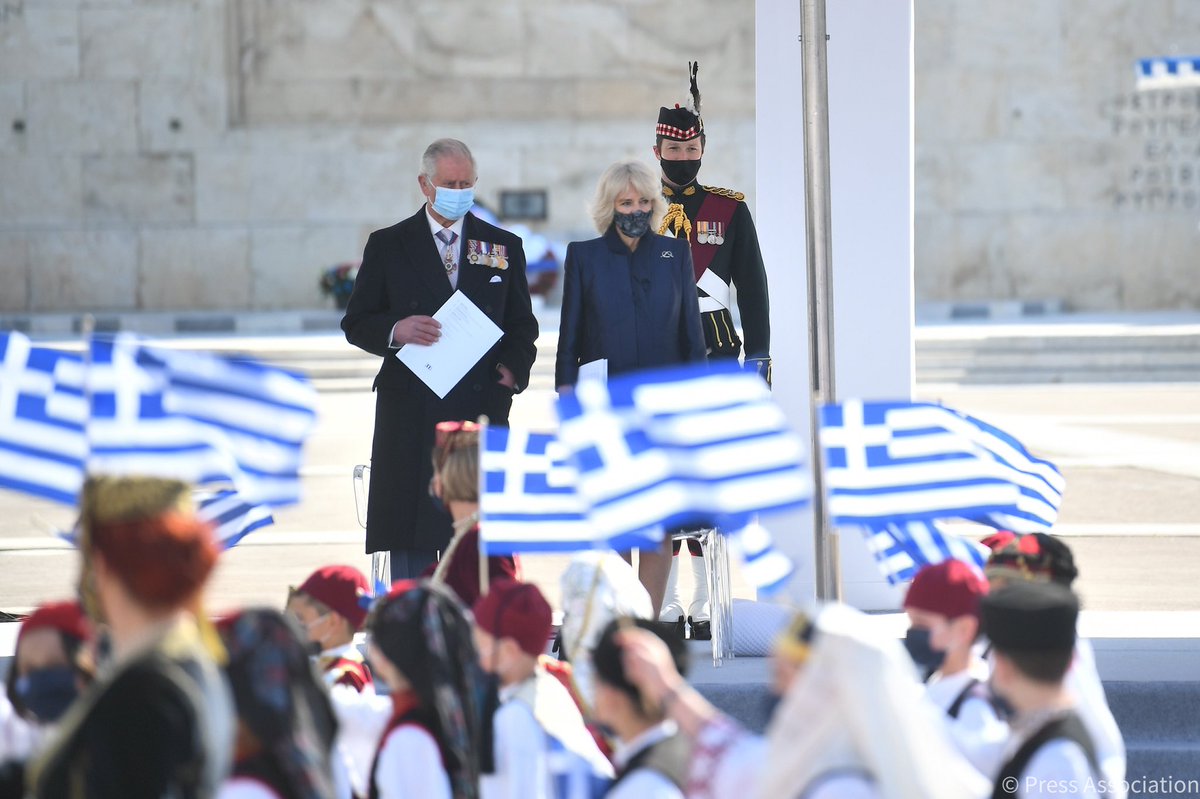 ClarenceHouse's tweet photo. As part of the Bicentenary Independence Day celebrations at Syntagma Square, The Prince of Wales and The Duchess of Cornwall view a military parade by members of the Hellenic Armed Forces, followed by a flypast.

#RoyalVisitGreece https://t.co/AkWGzQuW7m