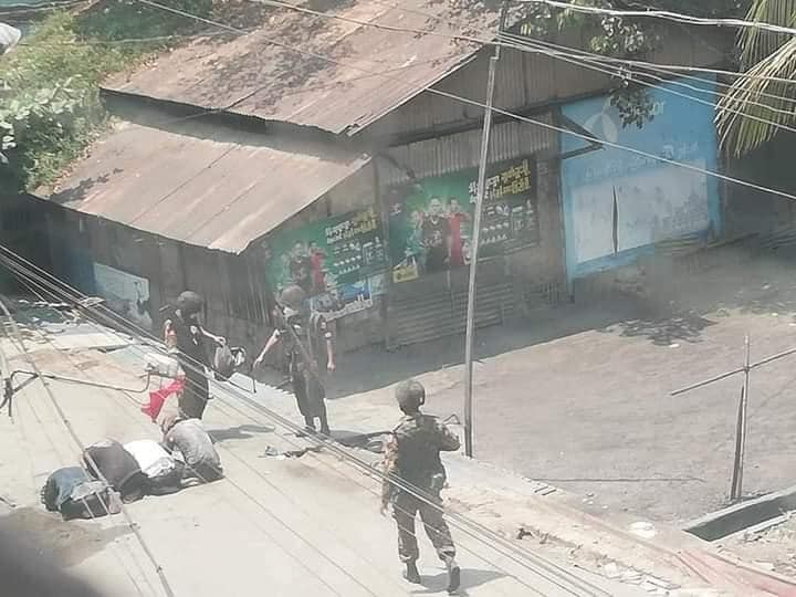 IrrawaddyNews's tweet photo. At least three civilians were injured when the security forces opened fire on wards in Yangon’s Thingangyun Township following a crackdown on anti-regime protesters. Police and soldiers broke into houses to detain the protesters, according to local residents. (Photo: CJ) https://t.co/rzqhRIsrpW