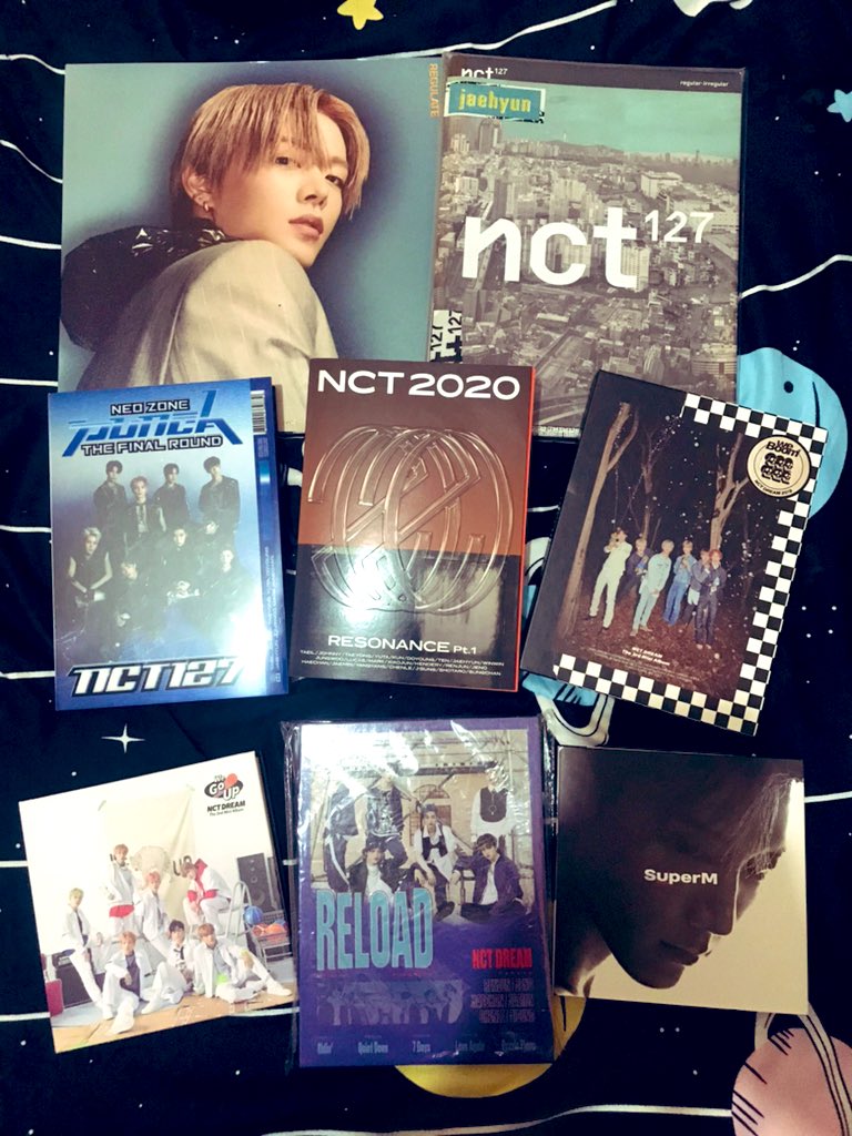 gelibeeeee's tweet photo. im cleaning my room rn and i realized that i have a lot of exo x nct albums already 😭 sana makain ko to pag wala na kong pera 😂😂😂 https://t.co/Z2AO0Nt5il