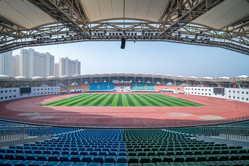Center stadium. Huangpu Sports Center Stadium. Suzhou Olympic Sports Centre Stadium. Стадион олимпийского спорткомплекса города Циньхуандао. Ордос Стэдиум Китай.