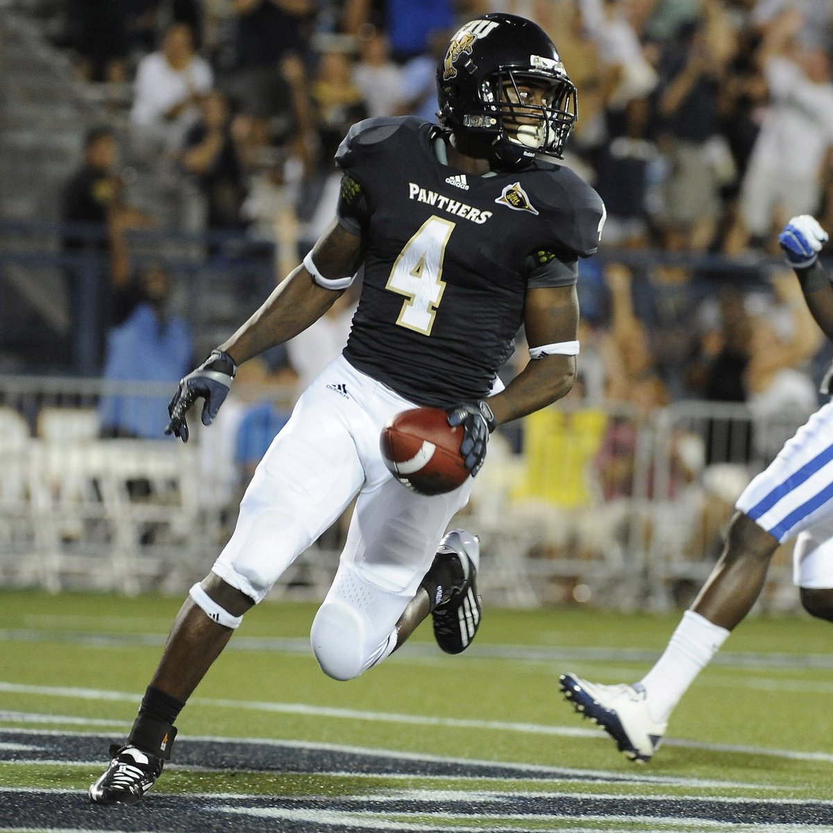 FIUFootball's tweet photo. It’s not a #TBT it’s a TY Thursday 👻 

Congrats to the 🐐@TYHilton13 on re-signing with the Colts! 

#PawsUp 🐾 | #PantherPride https://t.co/URN3Kvnf8u
