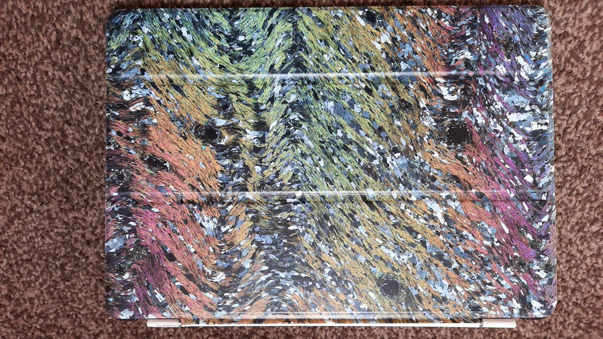 tomargles's tweet photo. A cheat tweet for #ThinSectionThursday: my ridiculously indulgent ipad cover featuring a garnet micaschist from Mull, courtesy of the #virtualmicroscope and @UCC . https://t.co/CknuHPBntH
