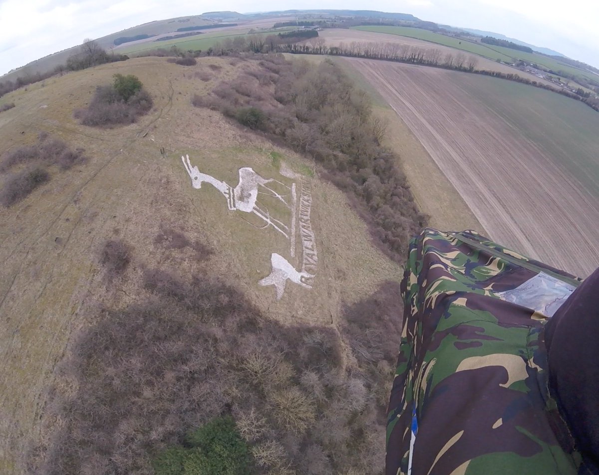 HelenR864's tweet photo. Some great shots of the #RoyalWarwickshire badge, cut into the Wiltshire chalk by soldiers during #WW1 and restored by @suttonbadges in recent years.  Pictures courtesy of @get_inverted, who flew by and has kindly allowed me to share. Thanks Robin! https://t.co/lqdYtyTTOh