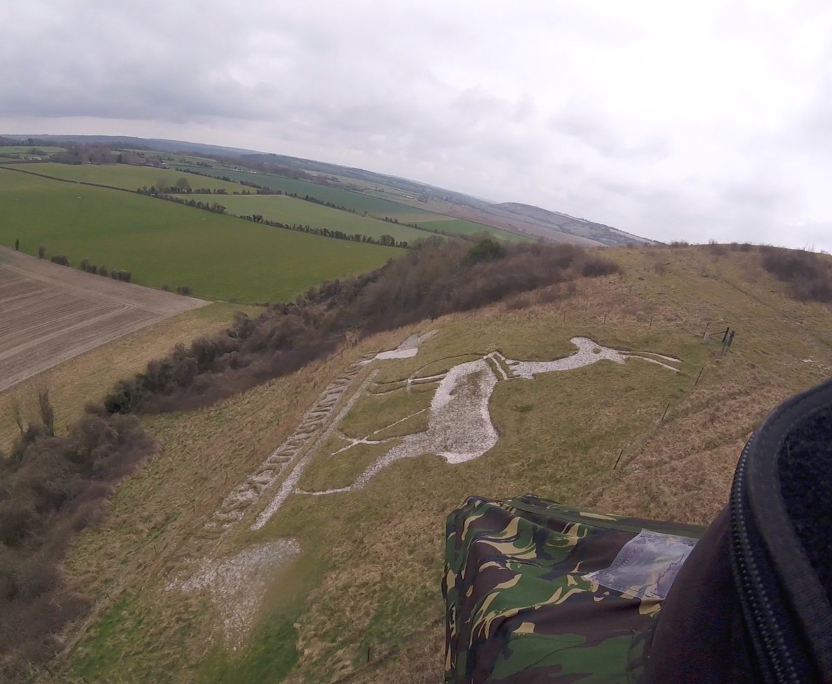 HelenR864's tweet photo. Some great shots of the #RoyalWarwickshire badge, cut into the Wiltshire chalk by soldiers during #WW1 and restored by @suttonbadges in recent years.  Pictures courtesy of @get_inverted, who flew by and has kindly allowed me to share. Thanks Robin! https://t.co/lqdYtyTTOh