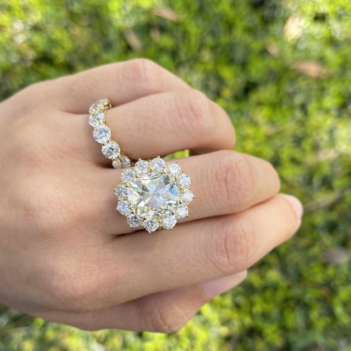 Modern elegance ✨ This lovely diamond ring features an 8.75ct old euro cushion in a beautiful 18k yellow gold mounting. Styled here with a 3.5ctw diamond eternity band. Both pieces now available at #ProvidentJewelry.