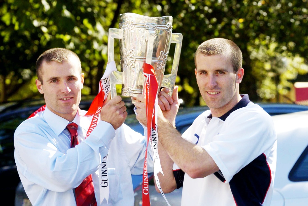 GAA__JOE's tweet photo. September 2004: Cork twins Ben (right) and Jerry (left) with Liam MacCarthy 🏆

The duo of all duos 👊 https://t.co/zd8WXtjS47
