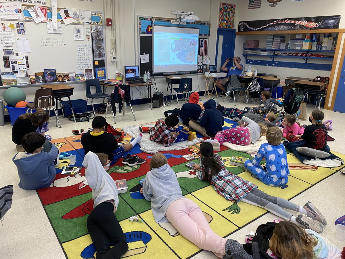 Read a Thon is a hit!  Enjoy these kids celebrating.  It's funny how Batman always takes a crime fighting break when Mr. Mckee's class is doing something cool.  Thanks to all. Great to have this event this year.