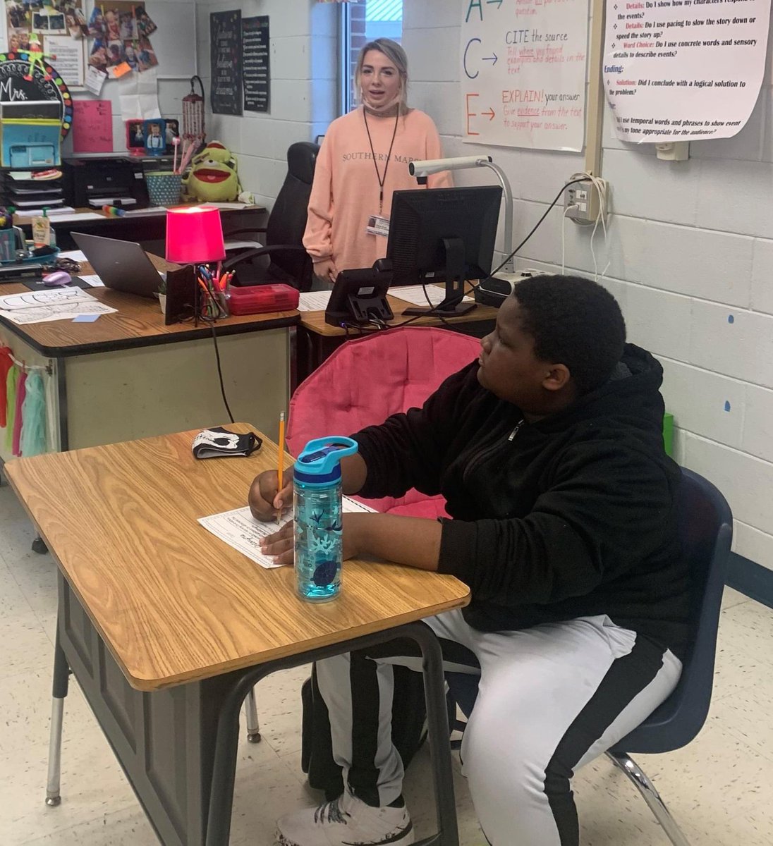 KimFullerEC's tweet photo. Today at ECMS, @ECCHS_GA’s Chloe Duck assisted with the lesson in guiding the students through some practice on synonyms and antonyms. Thanks to all for working together to give our students opportunities in the field of Education! #CTAEProud 💙🤘#PreparingFutureTeachers https://t.co/WzMd97D4aA