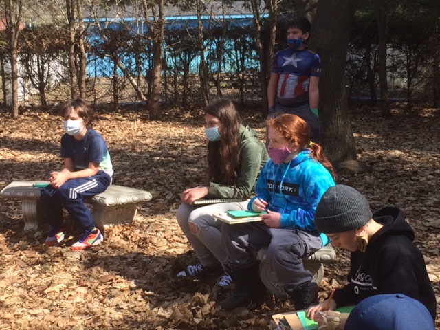 MsgrLeoCleary's tweet photo. Students in Ms. Almeida's Grade 5 class in the Peace Garden were observing nature using their five senses and practicing descriptive writing. They were inspired by a virtual Power Kid's webinar with Scientist Heather! #PVNCLEARNS https://t.co/DnAKvROWmS