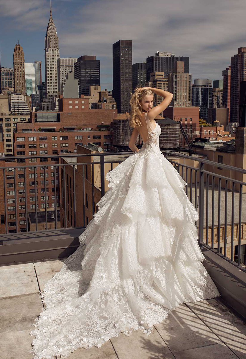 pninatornai's tweet photo. #TBT to this dreamy gown from my #DreamCollection! Are you loving the layered lace skirt and low back? https://t.co/MBxQSjZOsZ
