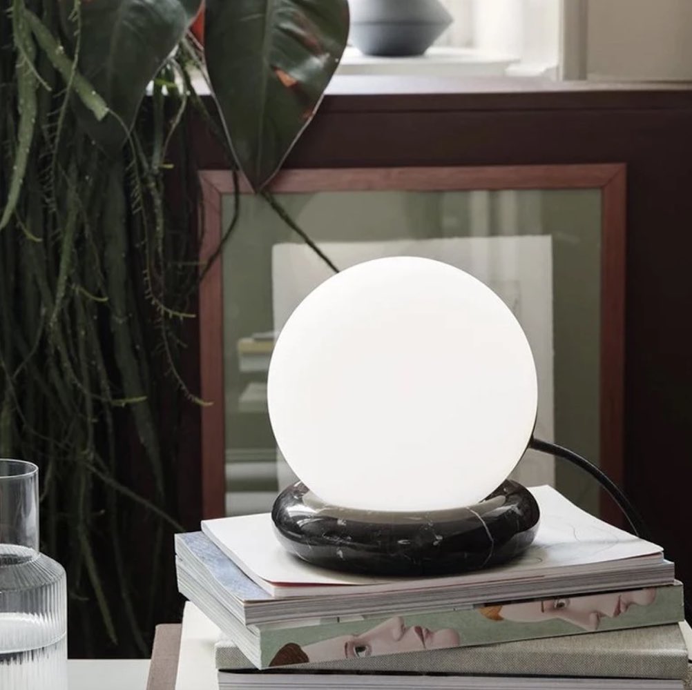 espacedonline's tweet photo. Rested on a ring of natural, solid, black marble, the #RestLamp's matte opal sphere creates a focal point in the room with its soft light. This elegant Ferm Living piece is now 30% OFF with our #ClosingSale!! | #lamp #lighting #espacedonline #vancouverbc https://t.co/13P2kFR7Qd
