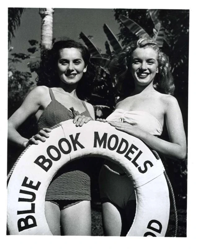 through Private Conover and other photographers, Marilyn finds her way to -get this- Blue Book Modeling Agency. later, there's a USAF Project Blue Book, but I'm not implying anything