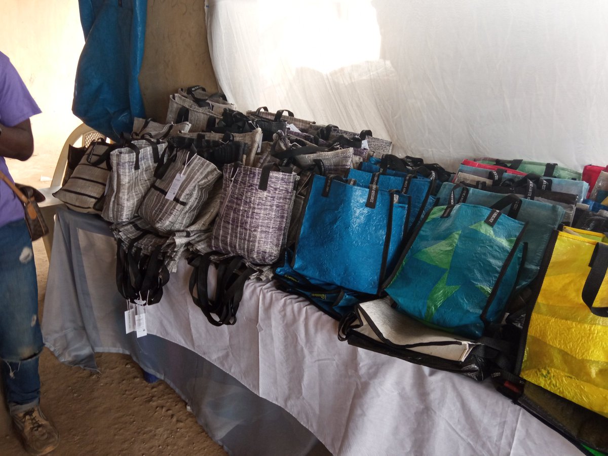 Hayzeewendy's tweet photo. I had some fun time with those @EcoBarter today at the graduating/exhibition ceremony of @Ecobarter_WREP women who have been undergoing training for close to 3 months. Yes everything you see is made from plastic waste bags and pure water sachet.#humansofecobarter #wastetoresource https://t.co/uQ5HS0zEfU